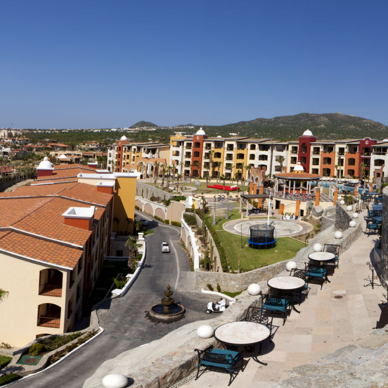 Panoramic view of Cabo San Lucas with houses and hills in the background, Mexico