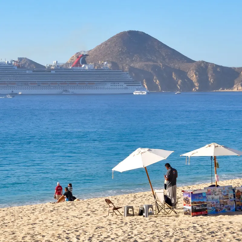 View of Playa Medano with cruise ship at the background in Los Cabos.