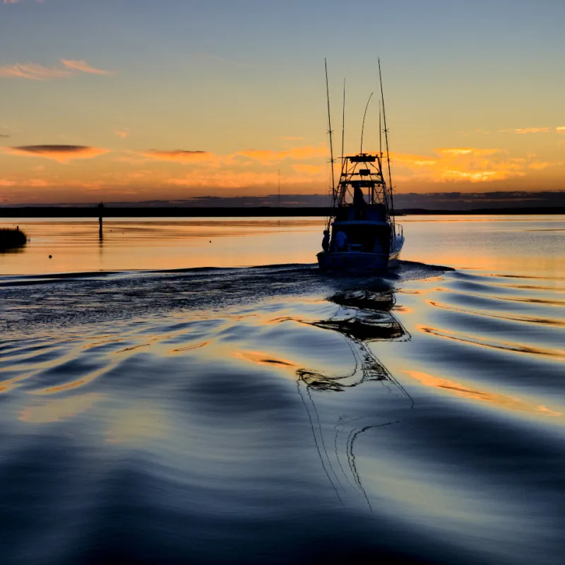 boat on the water during sunset