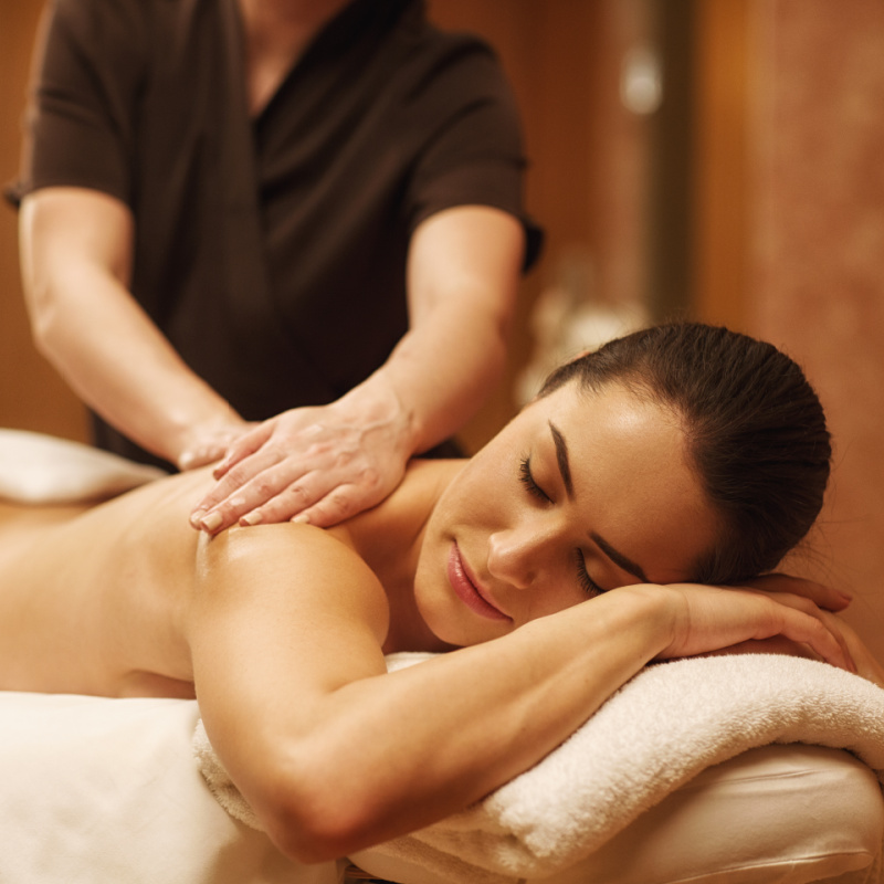 brown haired woman getting a massage