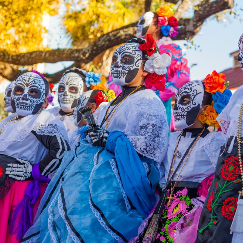 Girls dressed in day of the dead costumes