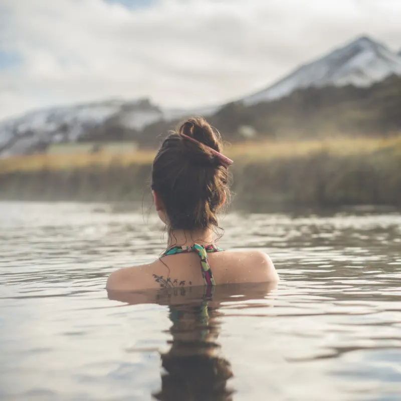 girl swimming in hot springs