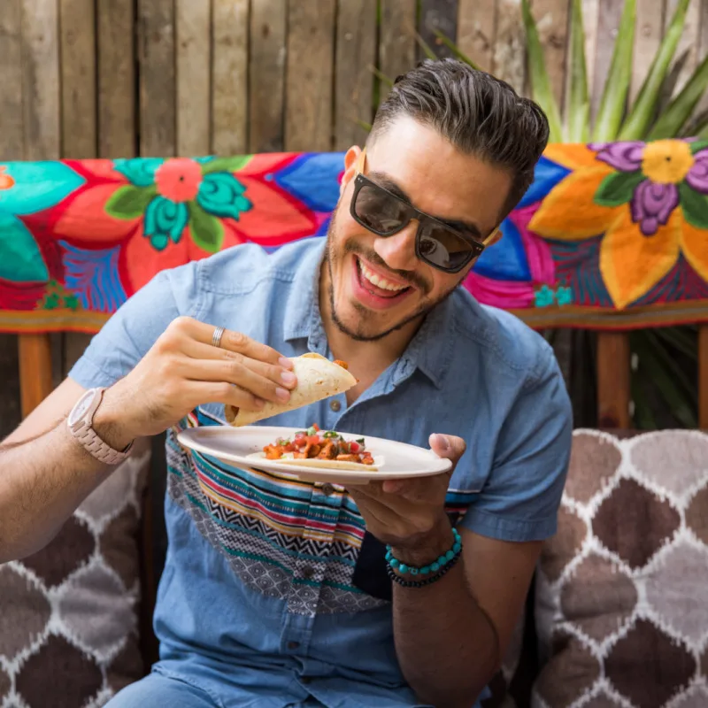 Man Eating Mexican Food on a Food Tour