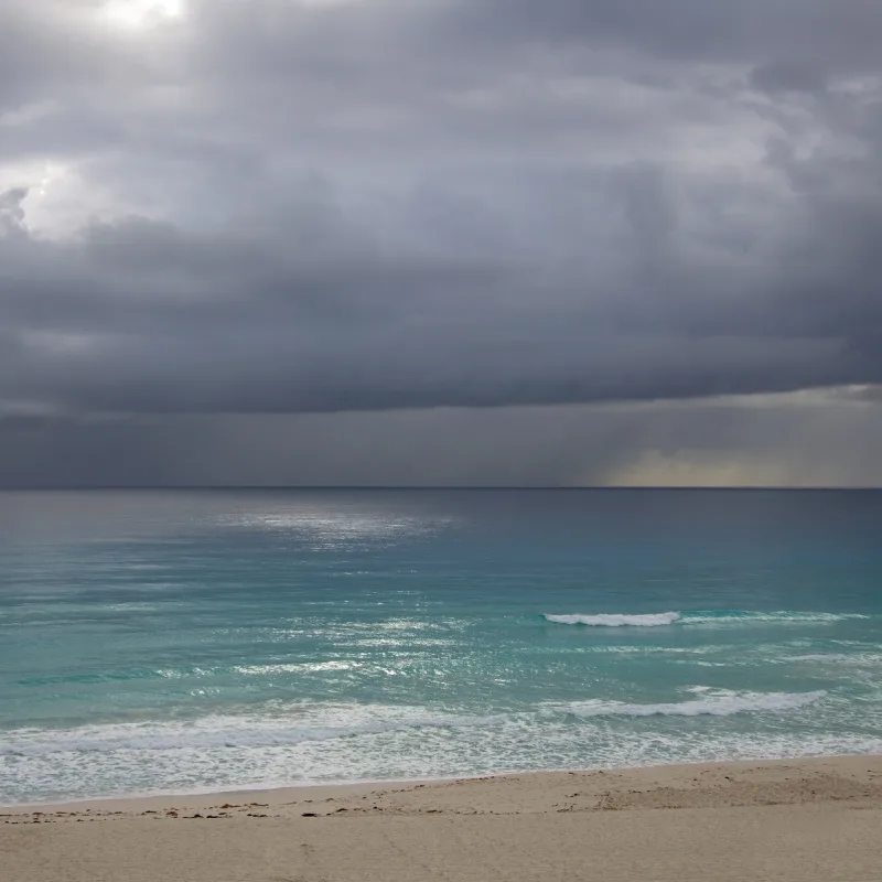 rain cloud over beach