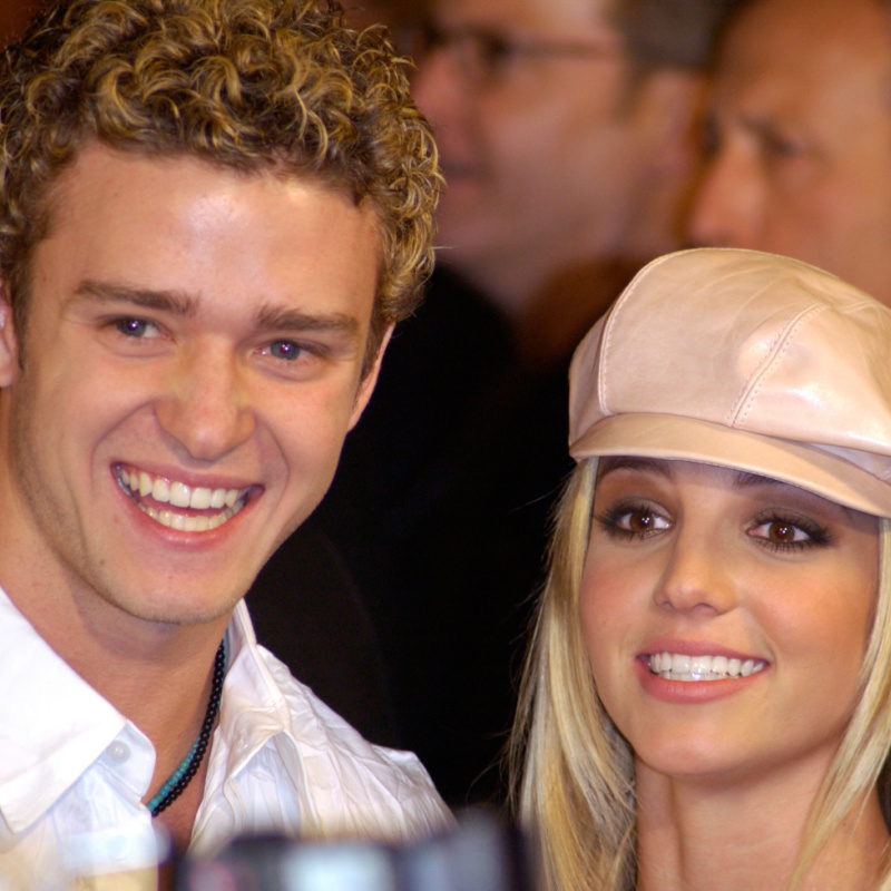 Pop star BRITNEY SPEARS & boyfriend _Nsync star JUSTIN TIMBERLAKE at the world premiere, in Hollywood, of her new movie Crossroads.