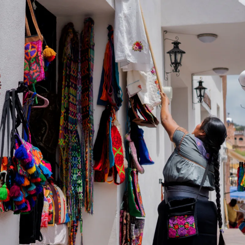 female vendor selling artisan craft goods