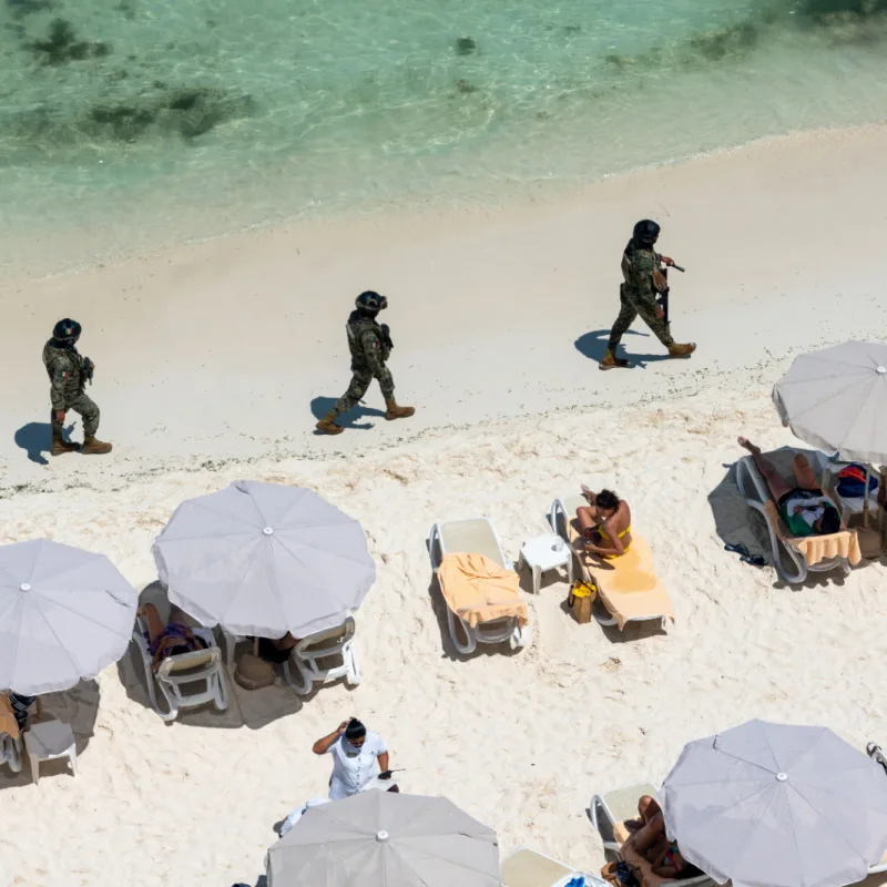 Police patroling the beach in Mexico