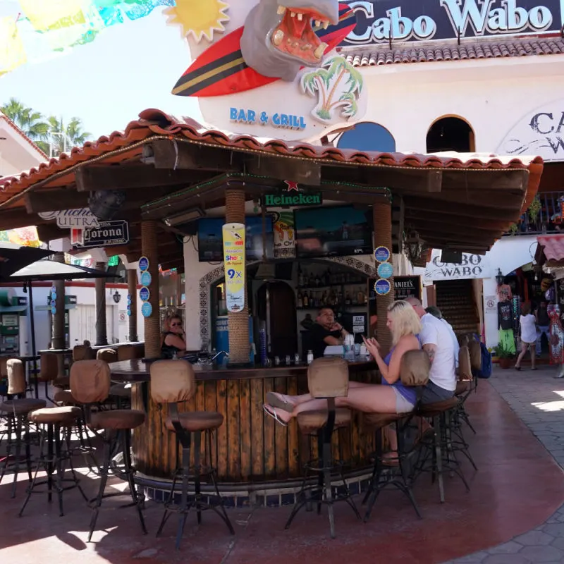 people at bar in Los Cabos