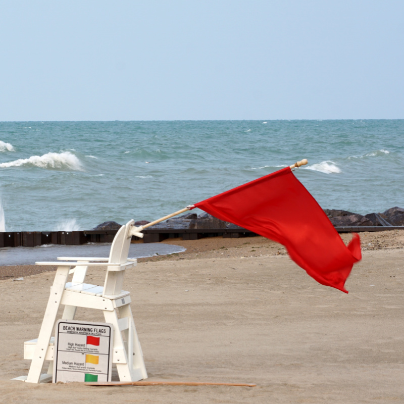 Red flag on beach in Los Cabos