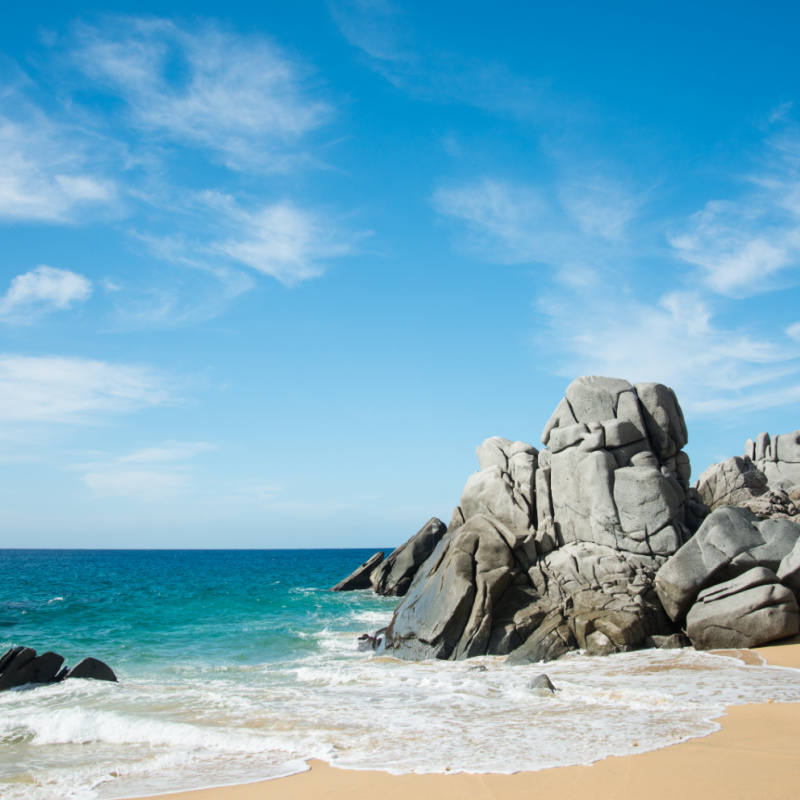 Rocks on a beach in Los Cabos on a clear day