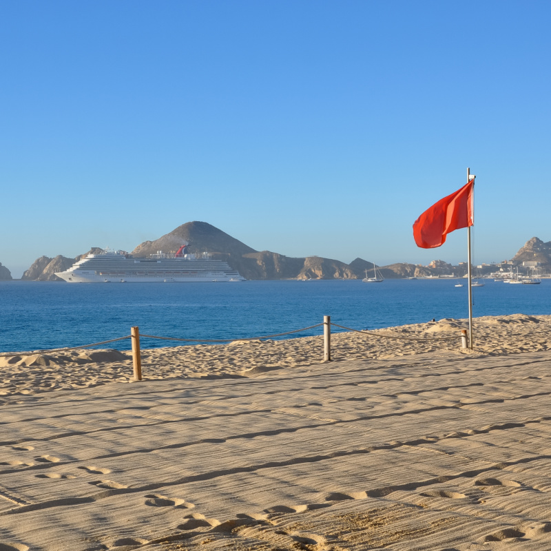 Red Warning Flag on Medano Beach in Cabo San Lucas, Mexico
