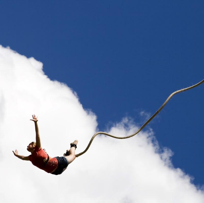 A lady mid bungee jump
