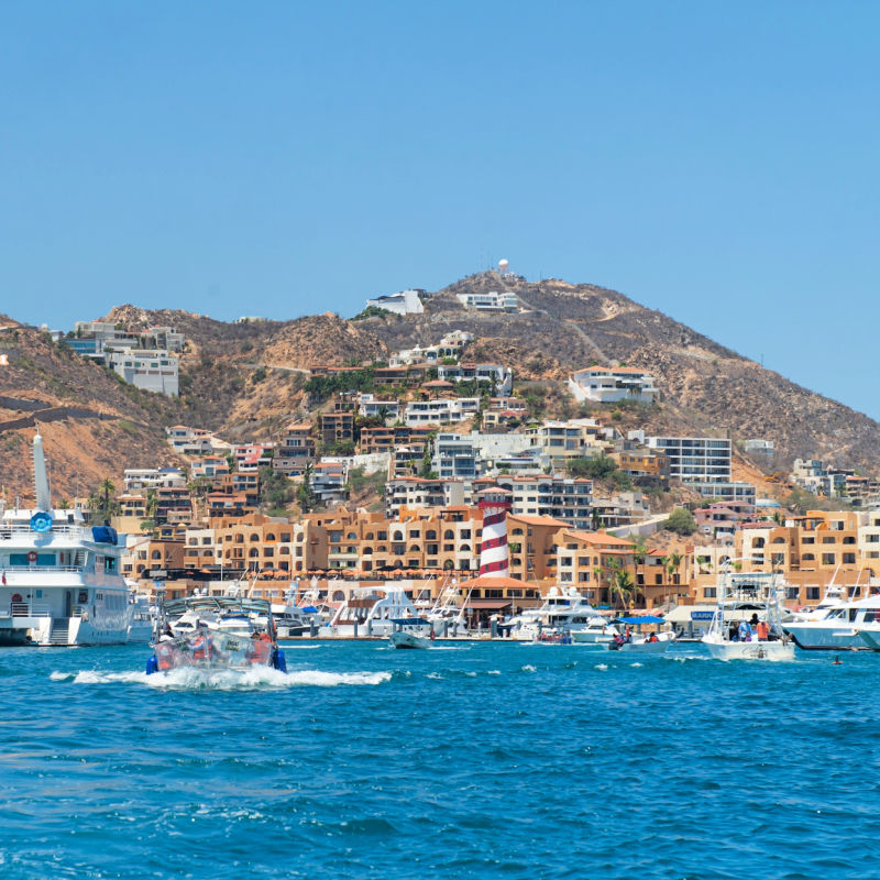 cabo San Lucas BCS Boats in the bay of Cabo San Lucas as part of the tourism that increases during the summer vacation season. the baja lifestyle