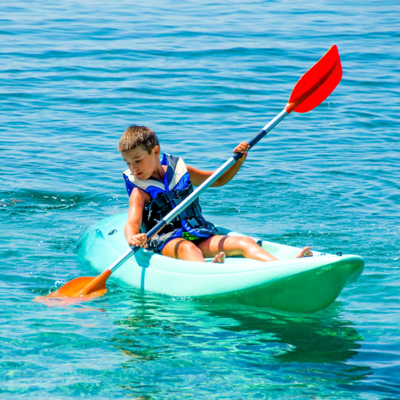 little boy kayaking