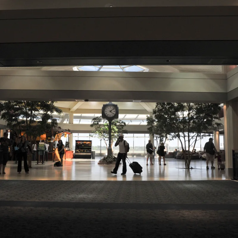 man with suitcase in milwaukee airport