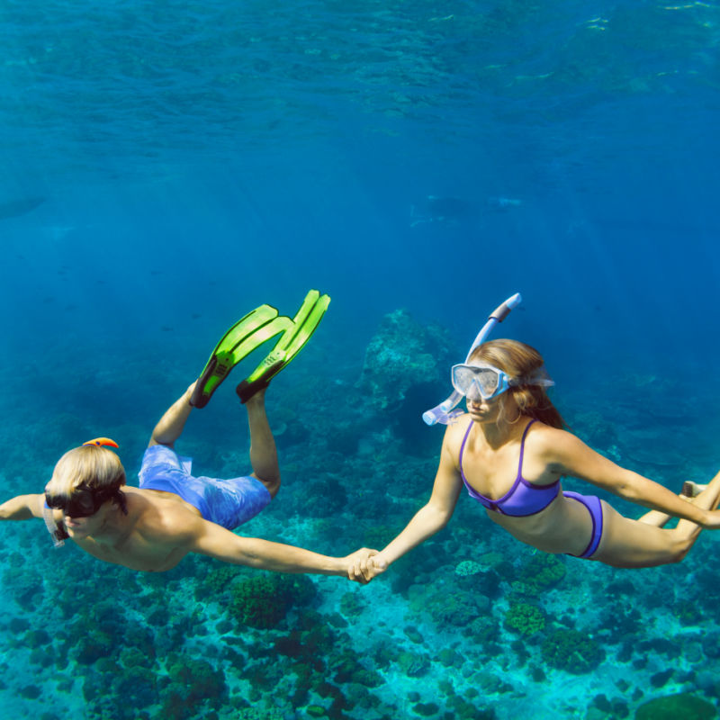 two girls scuba diving