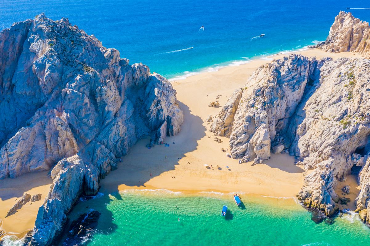 A view of the beach at lovers arch in los cabos from the air