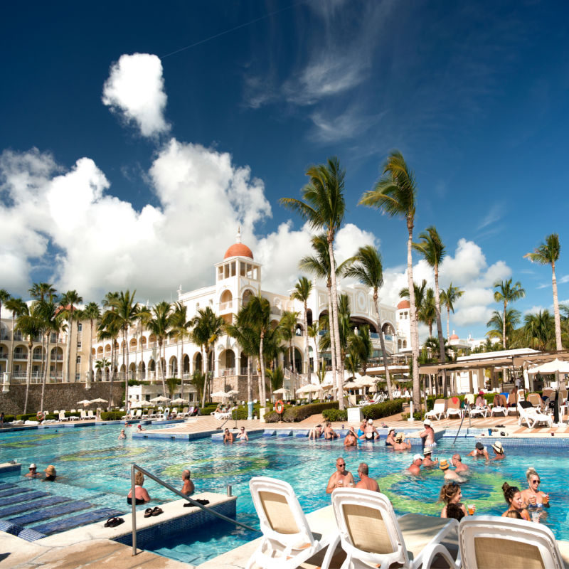 Busy resort pool in Los Cabos