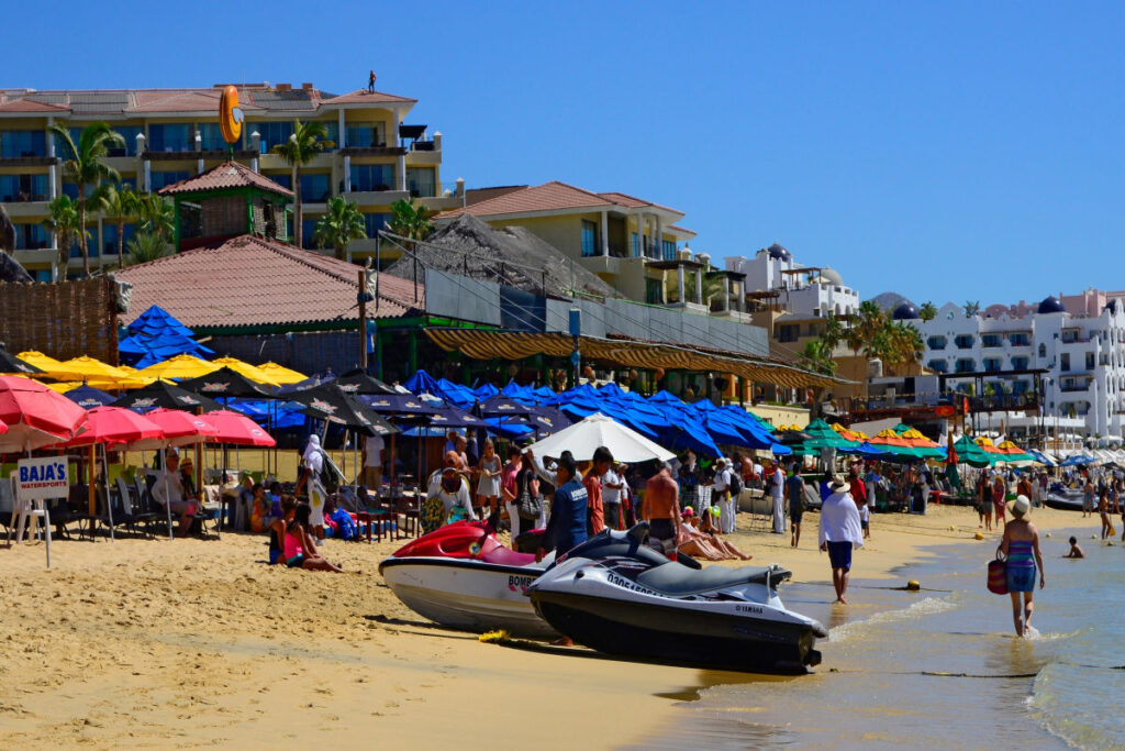 Medano Beach Filled with Tourists in Cabo San Lucas, Mexico