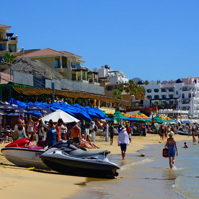 Medano Beach Filled with Tourists in Cabo San Lucas, Mexico