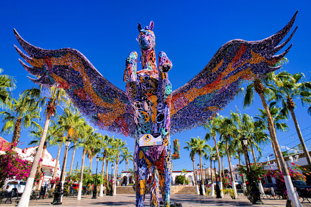 A fantastic colorful metal winged horse sculpture by Juan Sotomayor in the town's main plaza area. The town is known for its art and galleries.