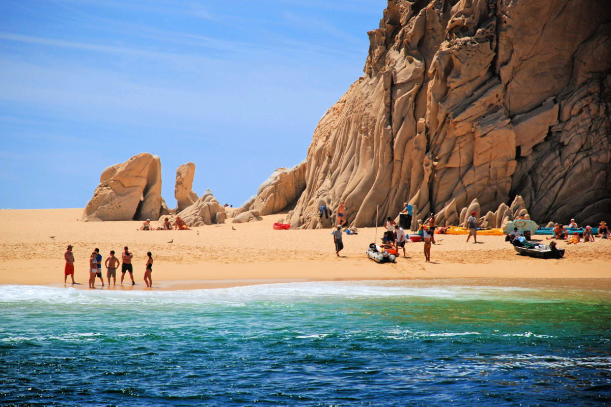 Los Cabos beach with tourists on it
