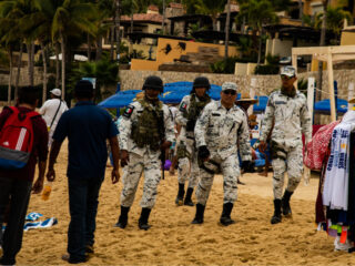 Security Elements on a Busy Beach in Los Cabos, Mexico
