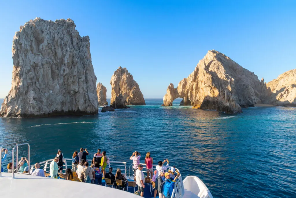 Tourists on a Boat Near the Famous Arch in Cabo San Lucas, Mexico