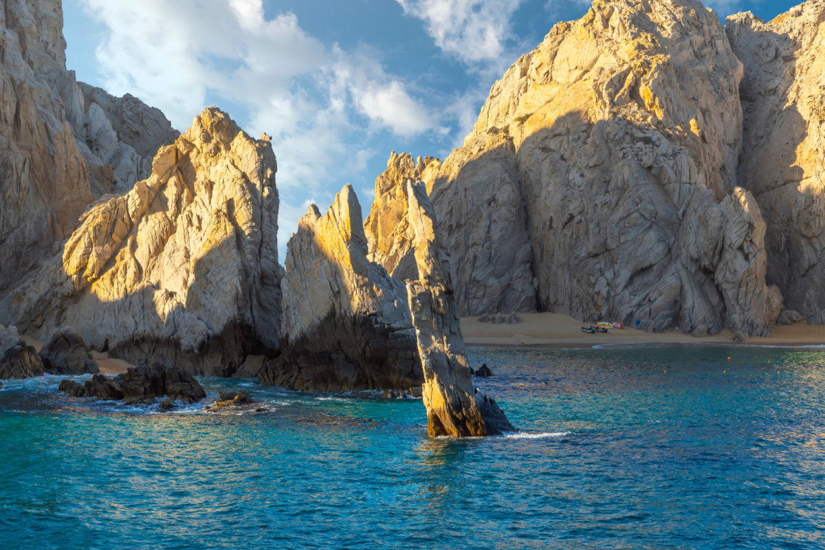 The Neptune's Finger rock formation near Lover's Beach at the Land's End El Arco coastal region at Cabo San Lucas, Mexico