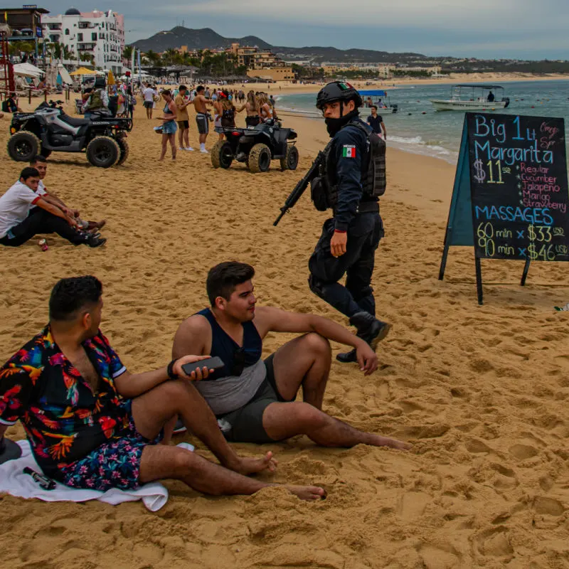 cabo police officer on beach