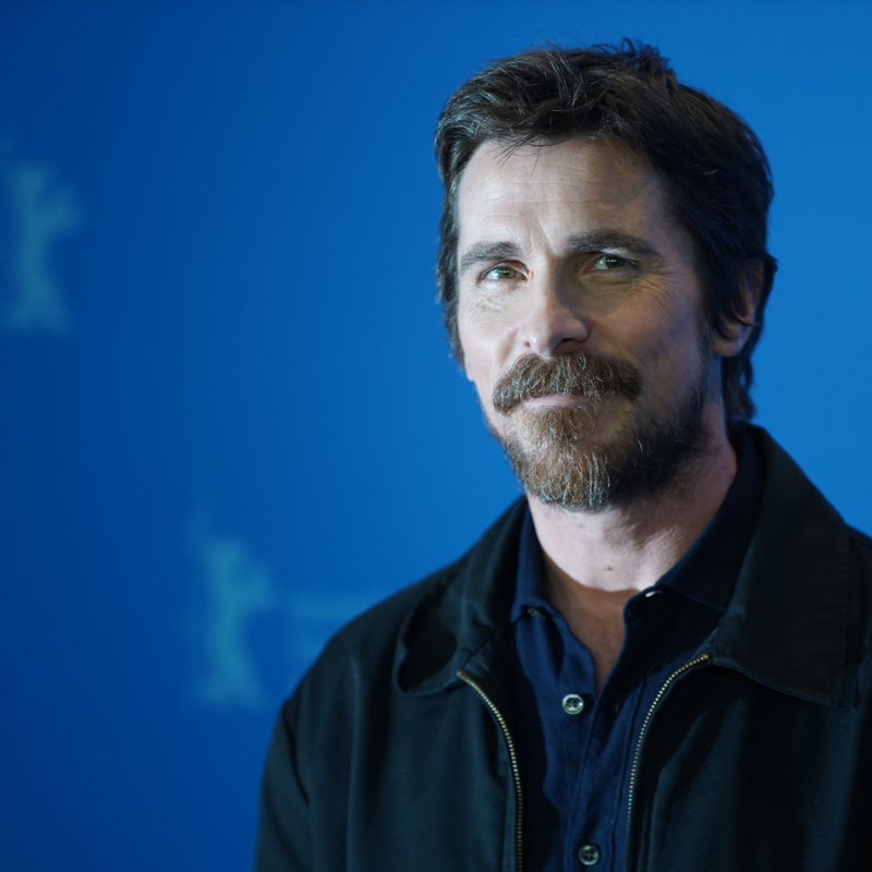 christian bale posing at event