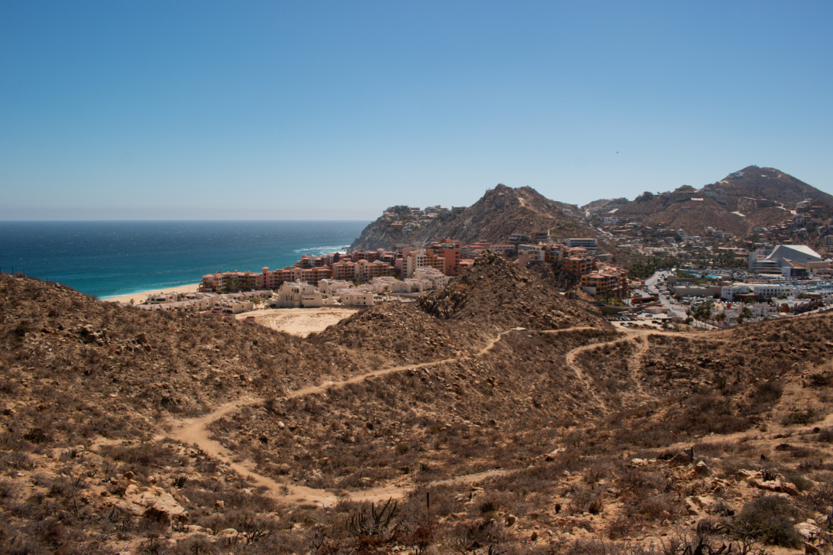Landscape view with mountains, town, and ocean in Mexico