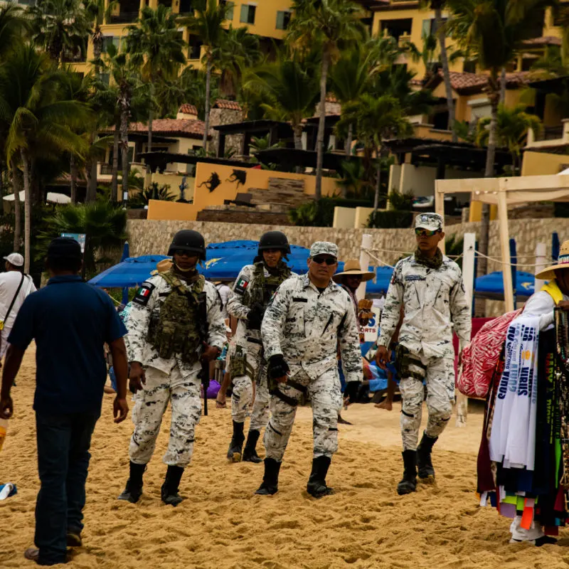 Military Officers Patrolling a Beach in Los Cabos