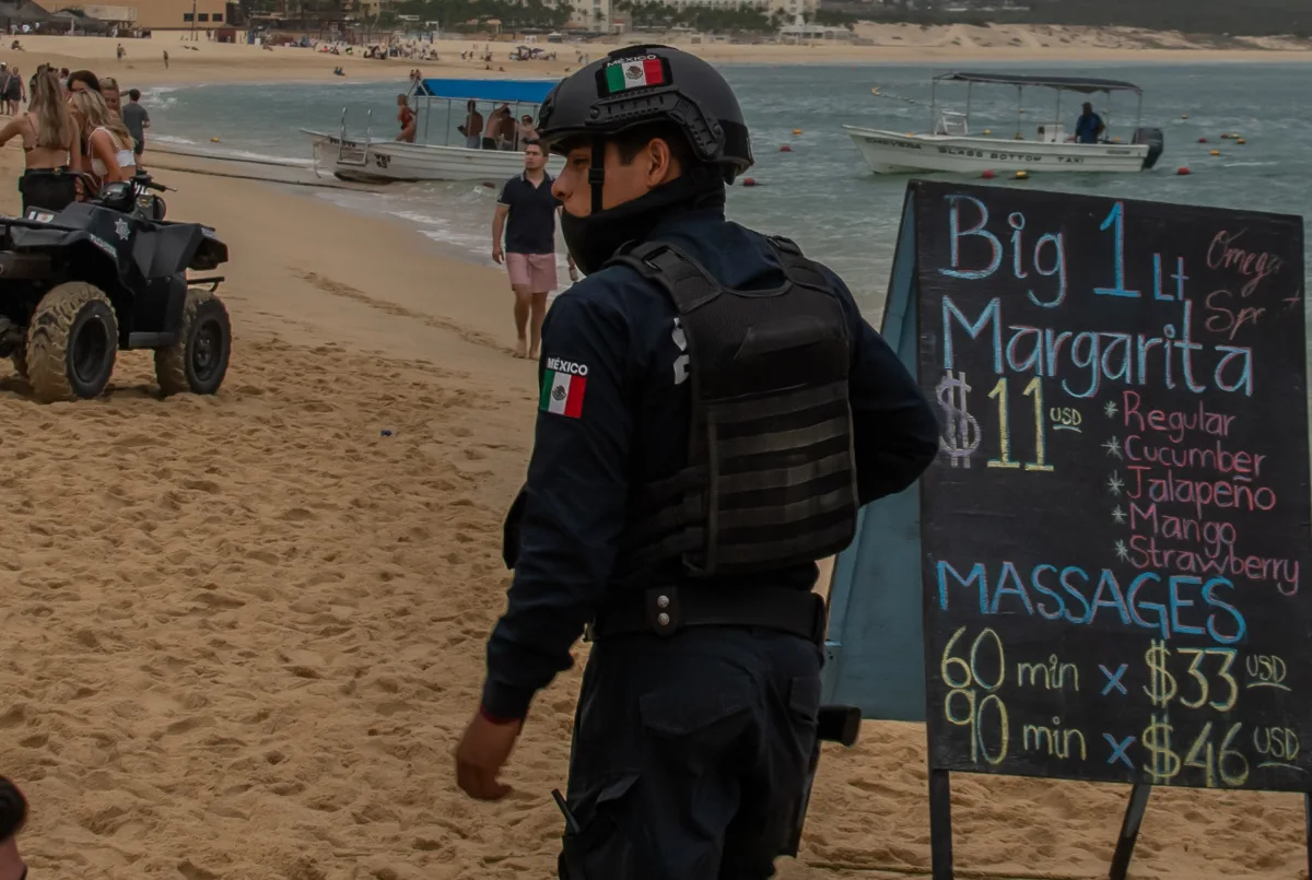 Police Officer Patrolling a Beach in Los Cabos, Mexico