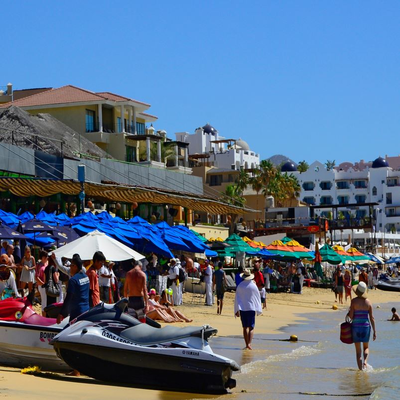 Jetskis and Tourists on Medano Beach in Cabo San Lucas, Mexico