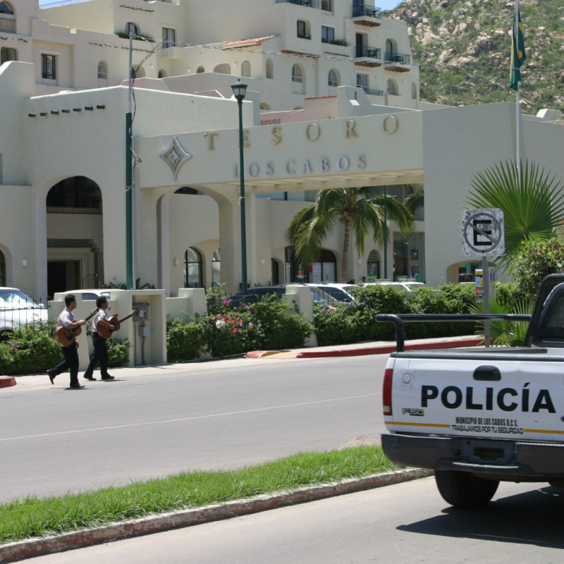 Police truck parked outside a resort in Los Cabos