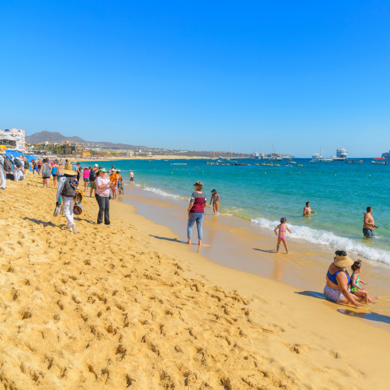 Tourists on a Beach in Cabo San Lucas, Mexico