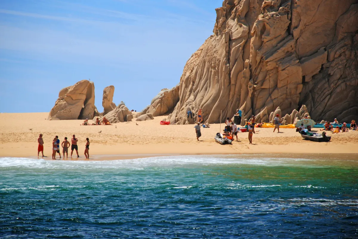 Tourists on Lover's Beach in Cabo San Lucas, Mexico