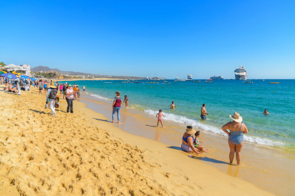 Tourists on a Beach in Cabo San Lucas, Mexico