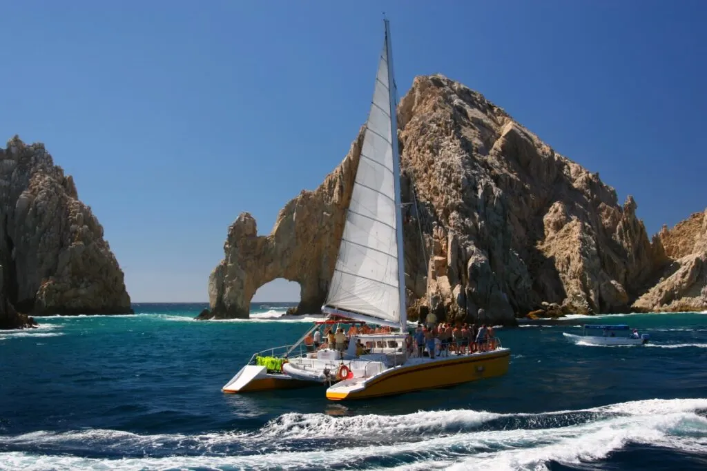 A catamaran at the famous Los Arcos in Cabo San Lucas, Mexico.