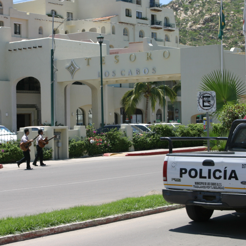 Police Vehicle Parked in Front of a Hotel in Los Cabos