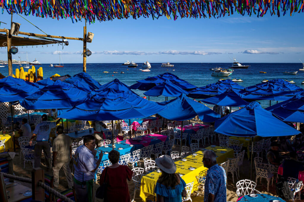 Tourists at the Popular La Oficina Restaurant in Cabo San Lucas, Mexico