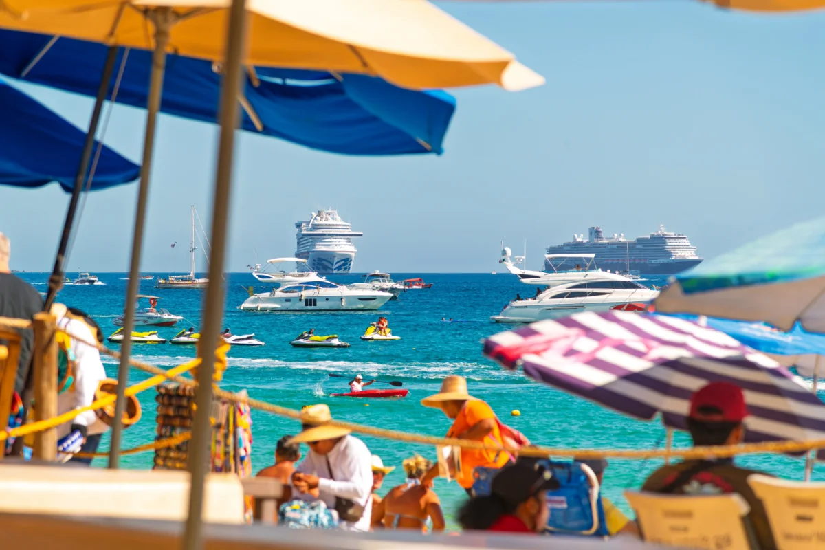 Vendors walking on Medano Beach in Los Cabos