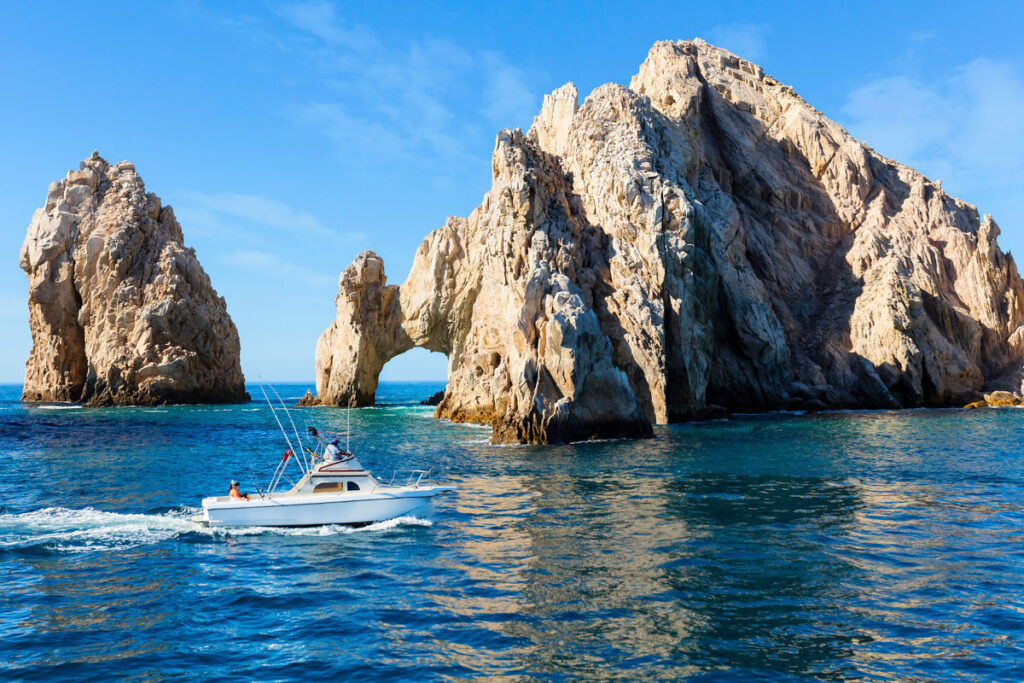 Fishing boat returns from a day out on the water in Los Cabos, Mexico