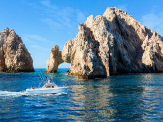 Fishing boat returns from a day out on the water in Los Cabos, Mexico