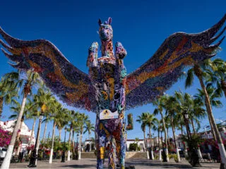 TODOS SANTOS, B.C.S., MEXICO - A fantastic colorful metal winged horse sculpture by Juan Sotomayor in the town's main plaza area. The town is known for its art and galleries.
