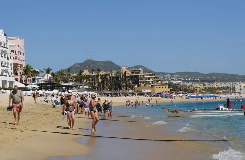 Tourists on beach in Cabo