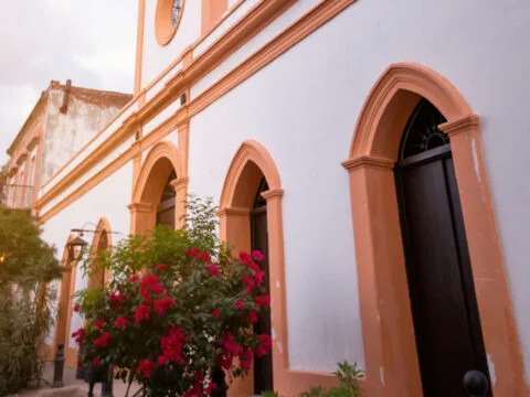 Historic Colonial style buildings stand in the old mining town of El Triunfo, Baja California Sur, Mexico.