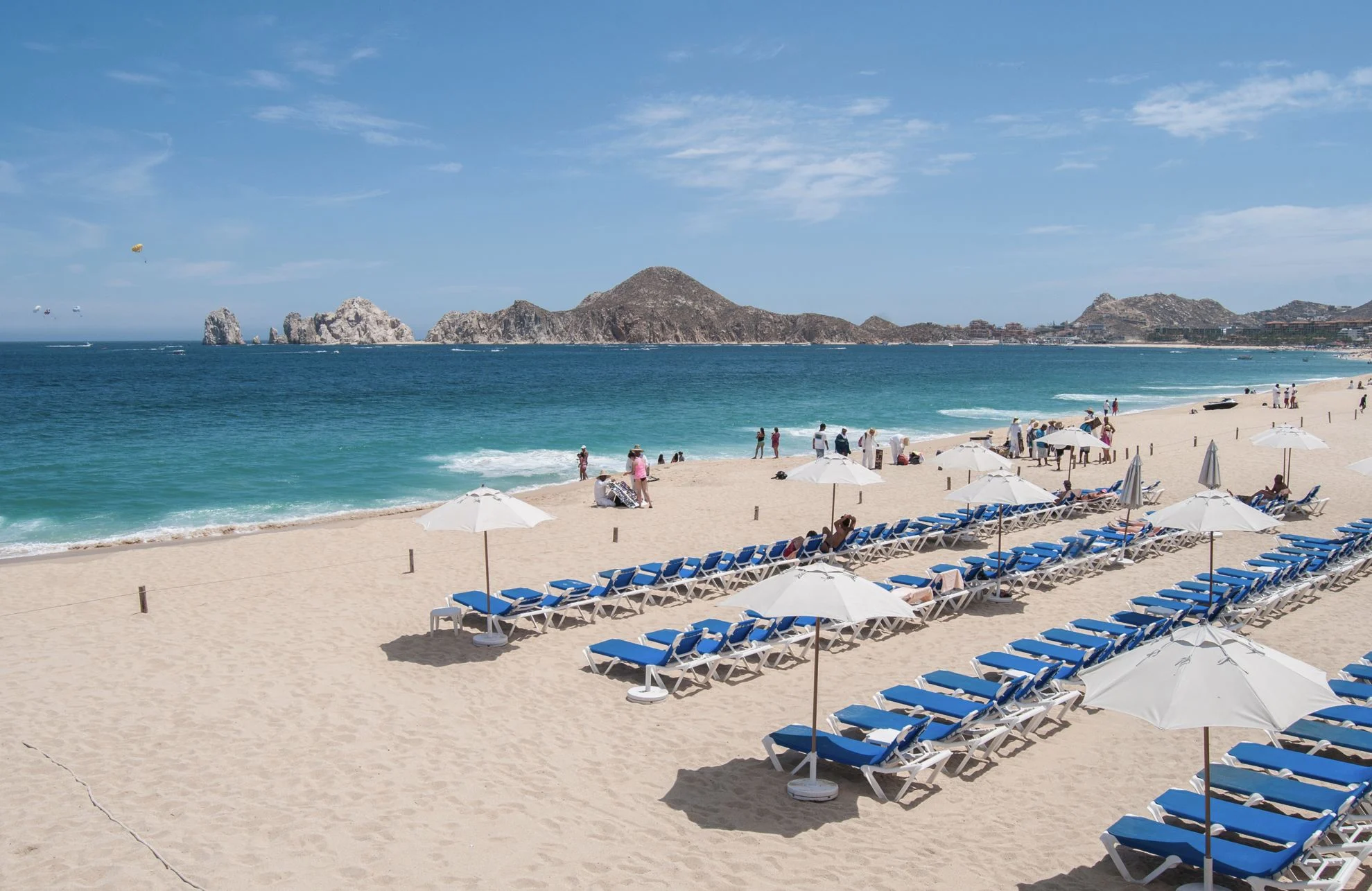 Medano Beach Filled with chairs in Front of Riu Santa Fe