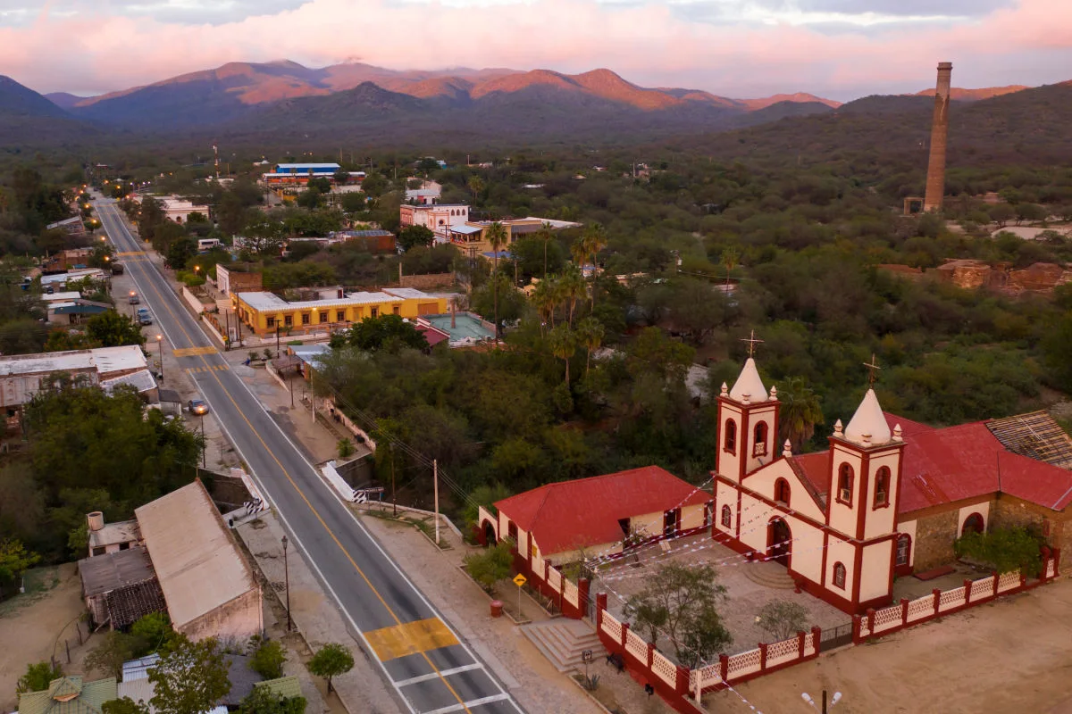 Sunset aerial view of the colonial style church in the old mining town of El Triunfo, Baja California Sur, Mexico.